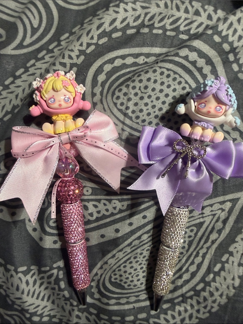 Pink or purple rhinestone beaded pen with Skull Panda topper.